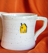 Handmade ceramic mug with yellow house | Artoon
