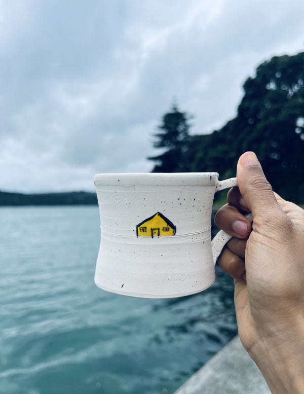 Handmade ceramic mug with cure house design | Artoon