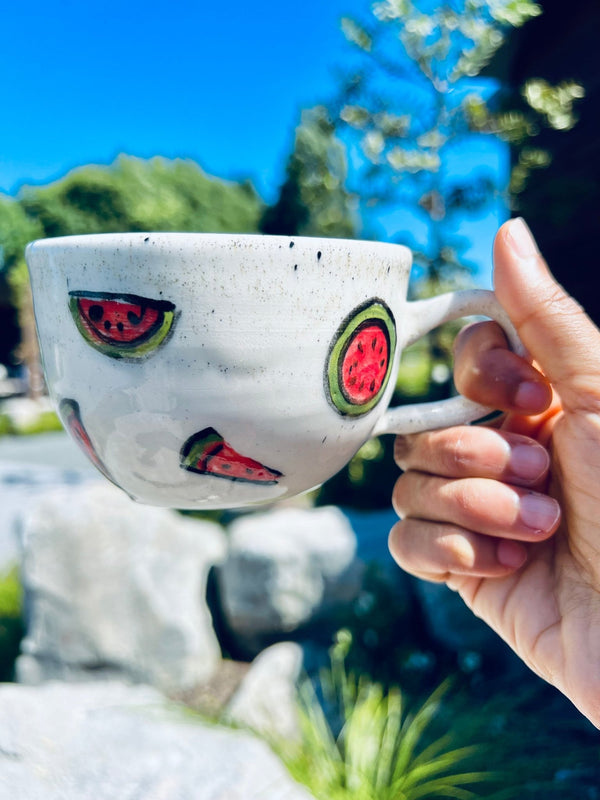 A Person Holding A Water Melon Handmade Ceramic Mug